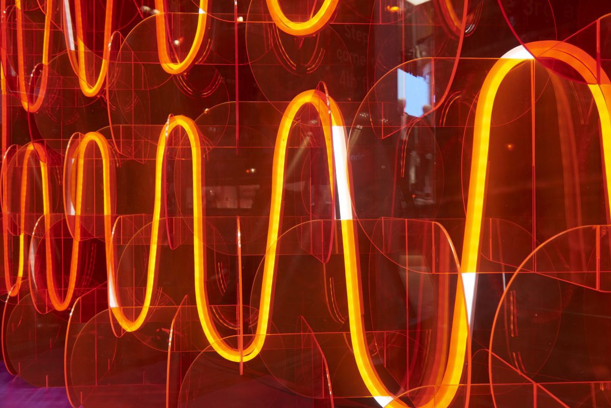red neon acrylic display Bespoke acrylic retail display