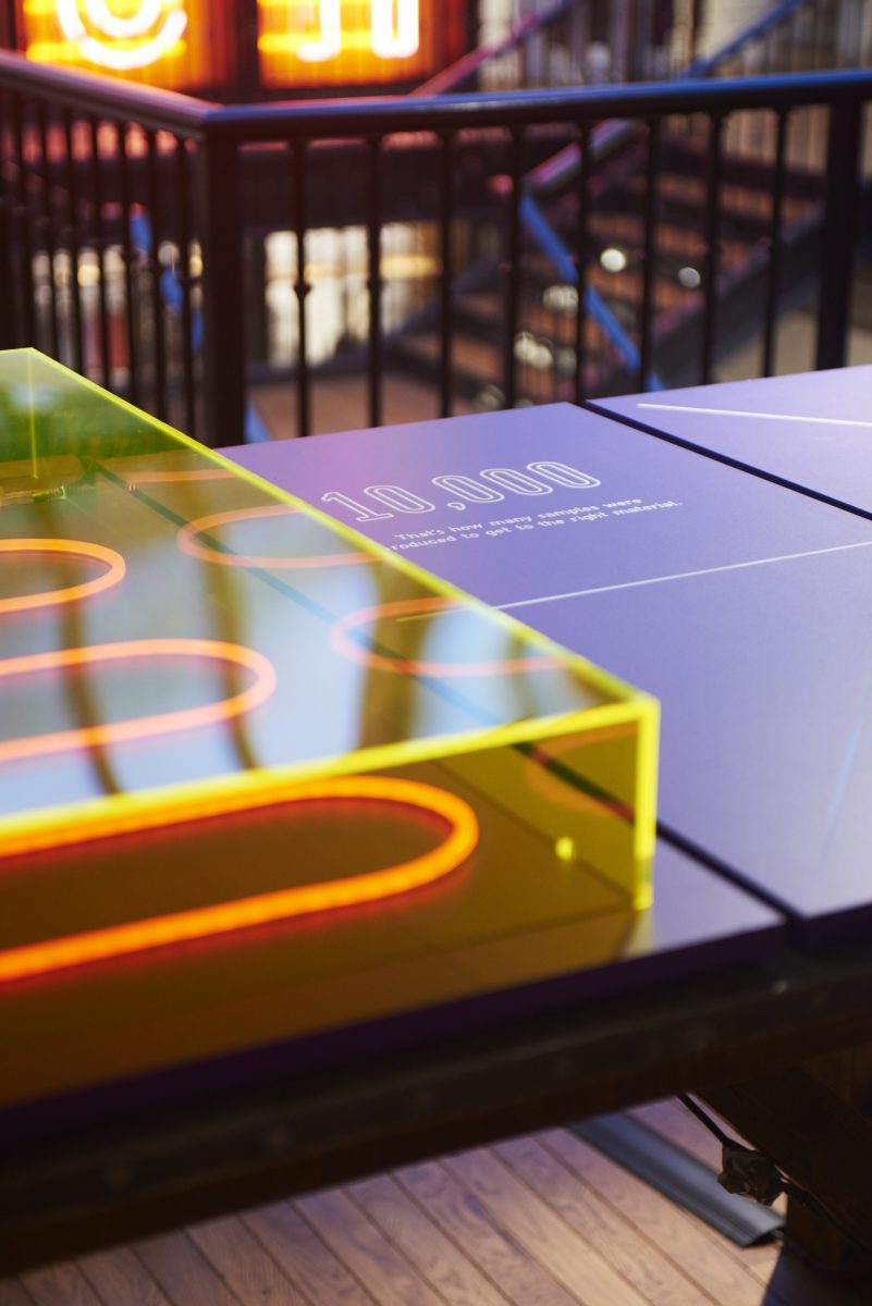 yellow neon acrylic table display Acrylic and neon retail display